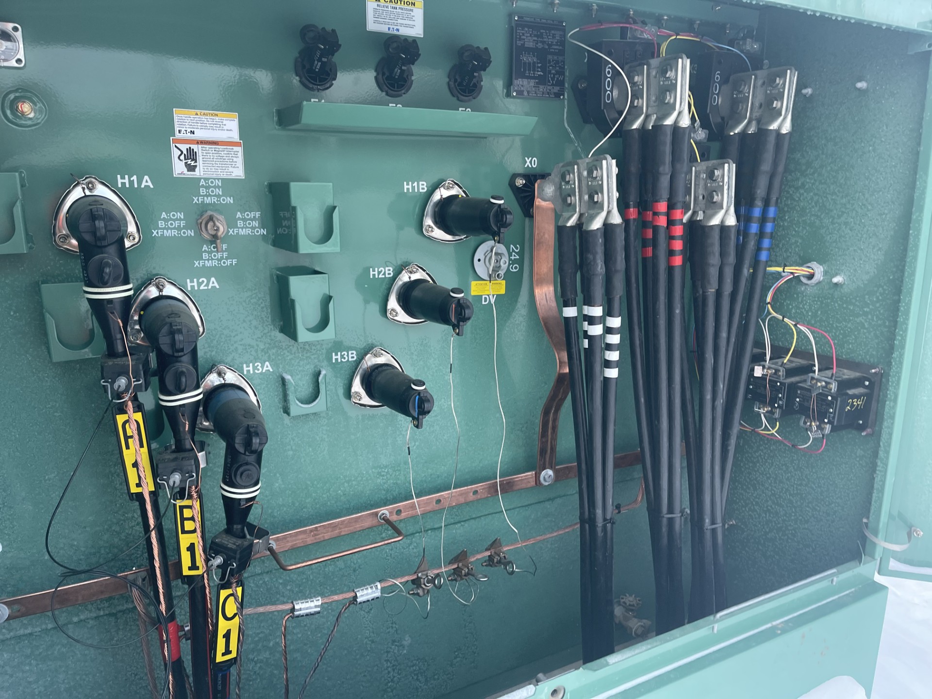 NuWave electrician making transformer connections on a commercial project